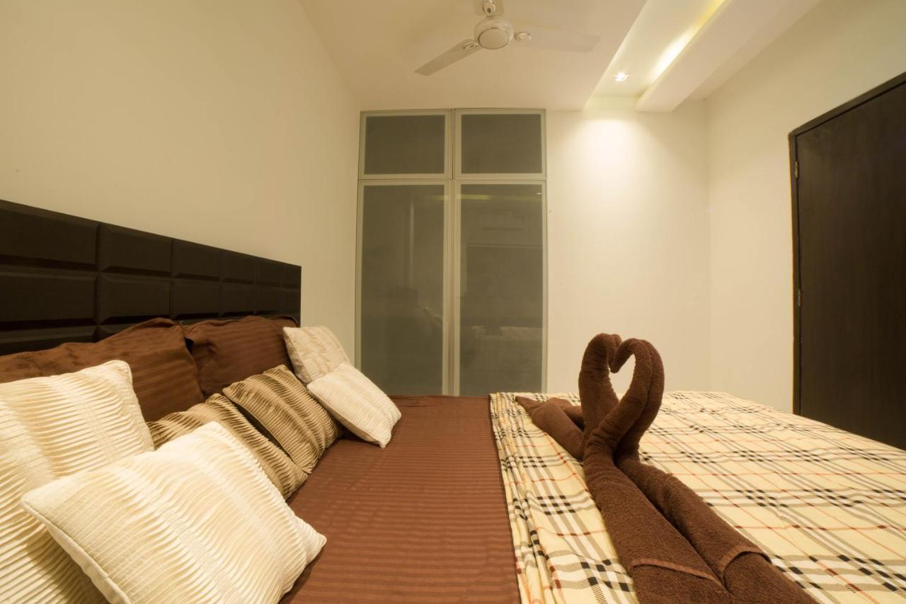Acons Palm Beach Alibag Bagian luar foto