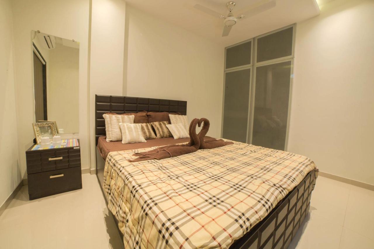 Acons Palm Beach Alibag Bagian luar foto