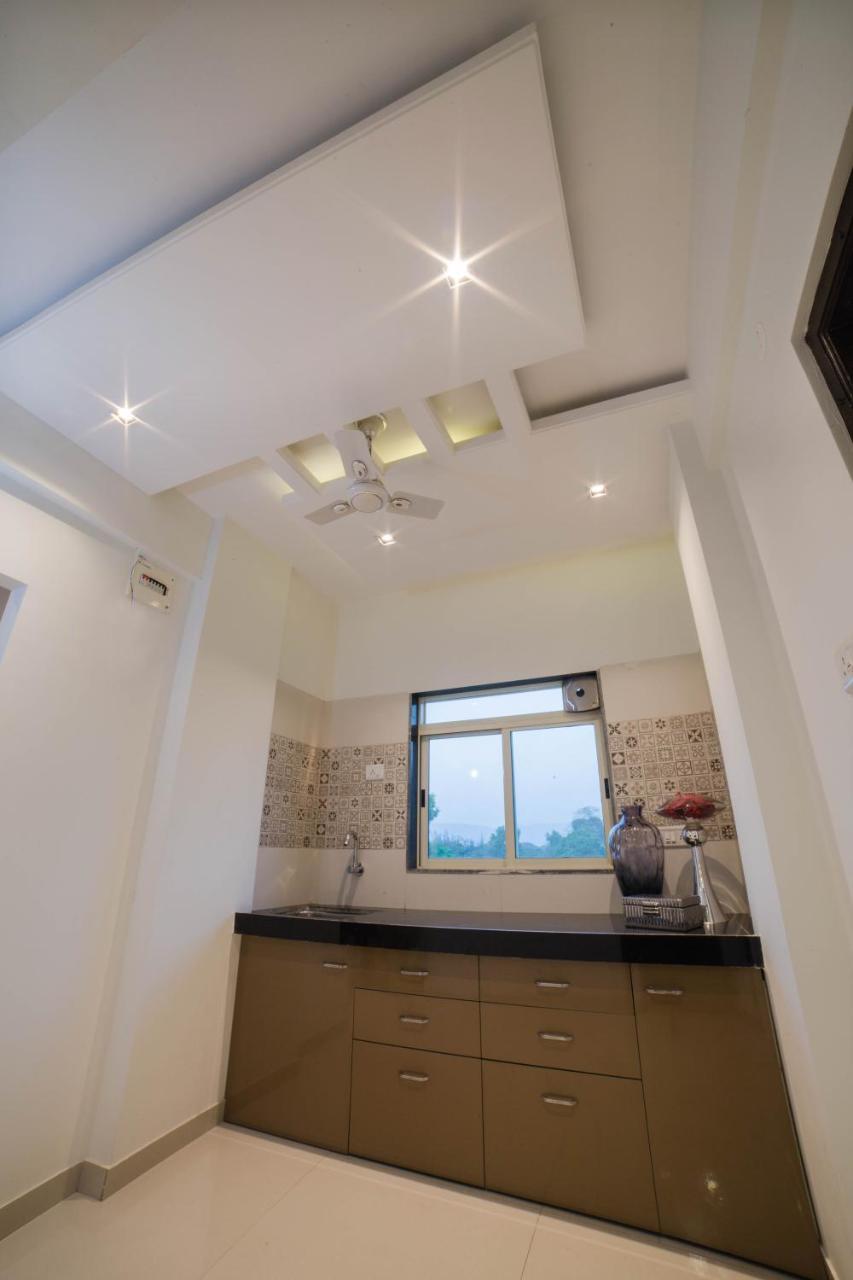 Acons Palm Beach Alibag Bagian luar foto